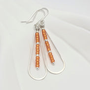 Harley - Silver & Orange Earrings Bijou by SAM   