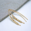 Wish - Gold with Gold Beads Earrings Bijou by SAM   