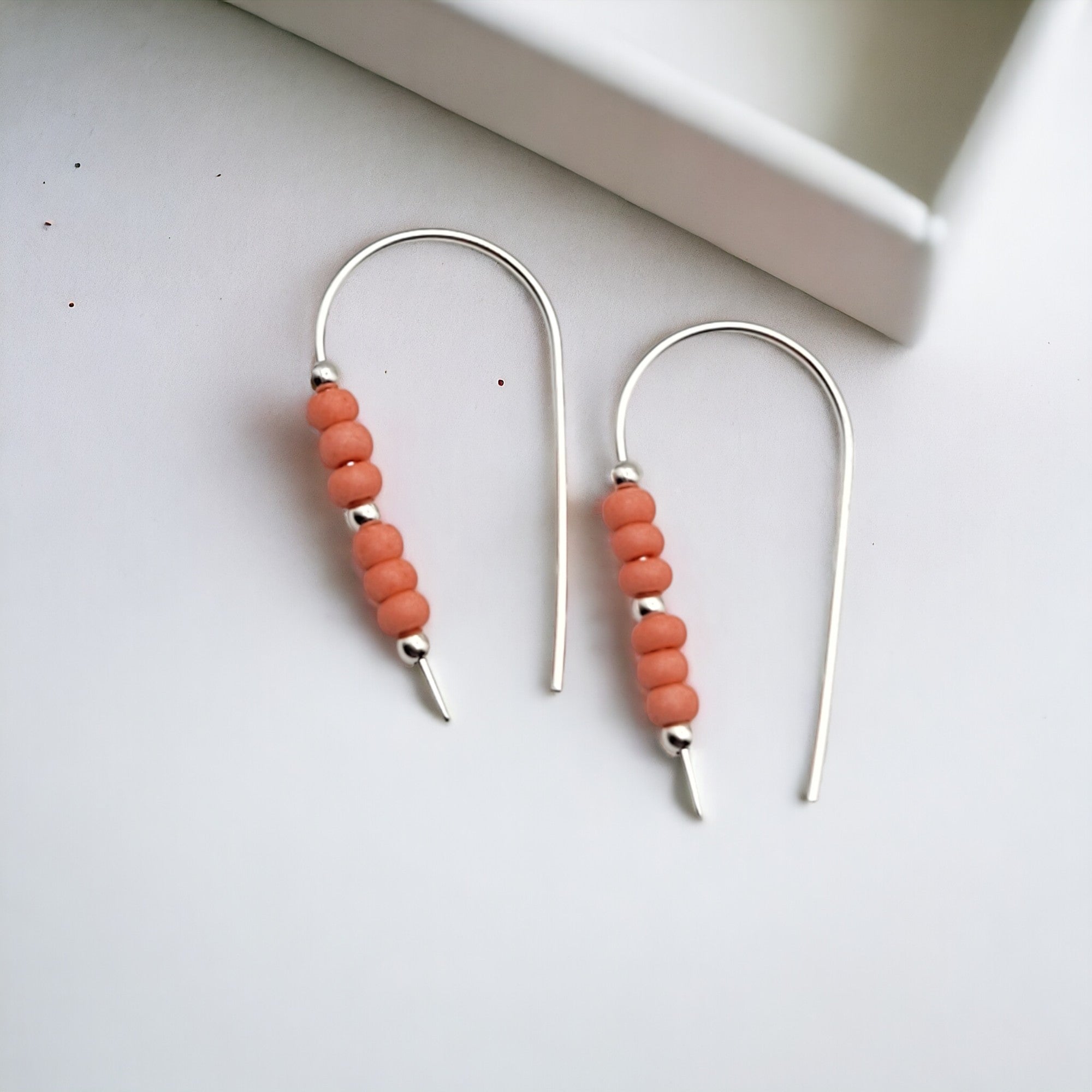 Cheval - Silver and Peach Corral Earrings Bijou by SAM   