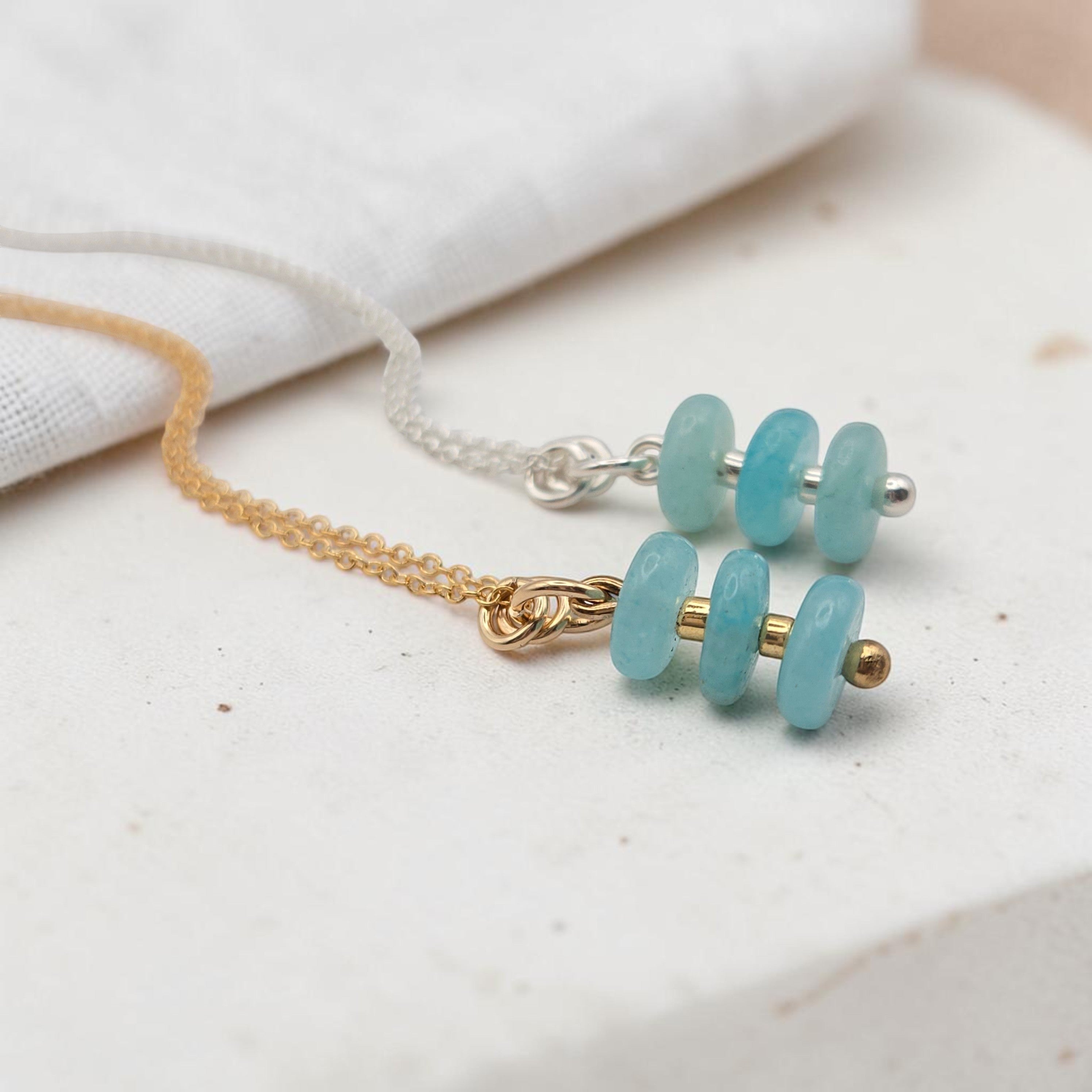 Bijou by SAM Northern Lights necklace featuring aqua-green amazonite stones on gold fill and sterling silver chains.
