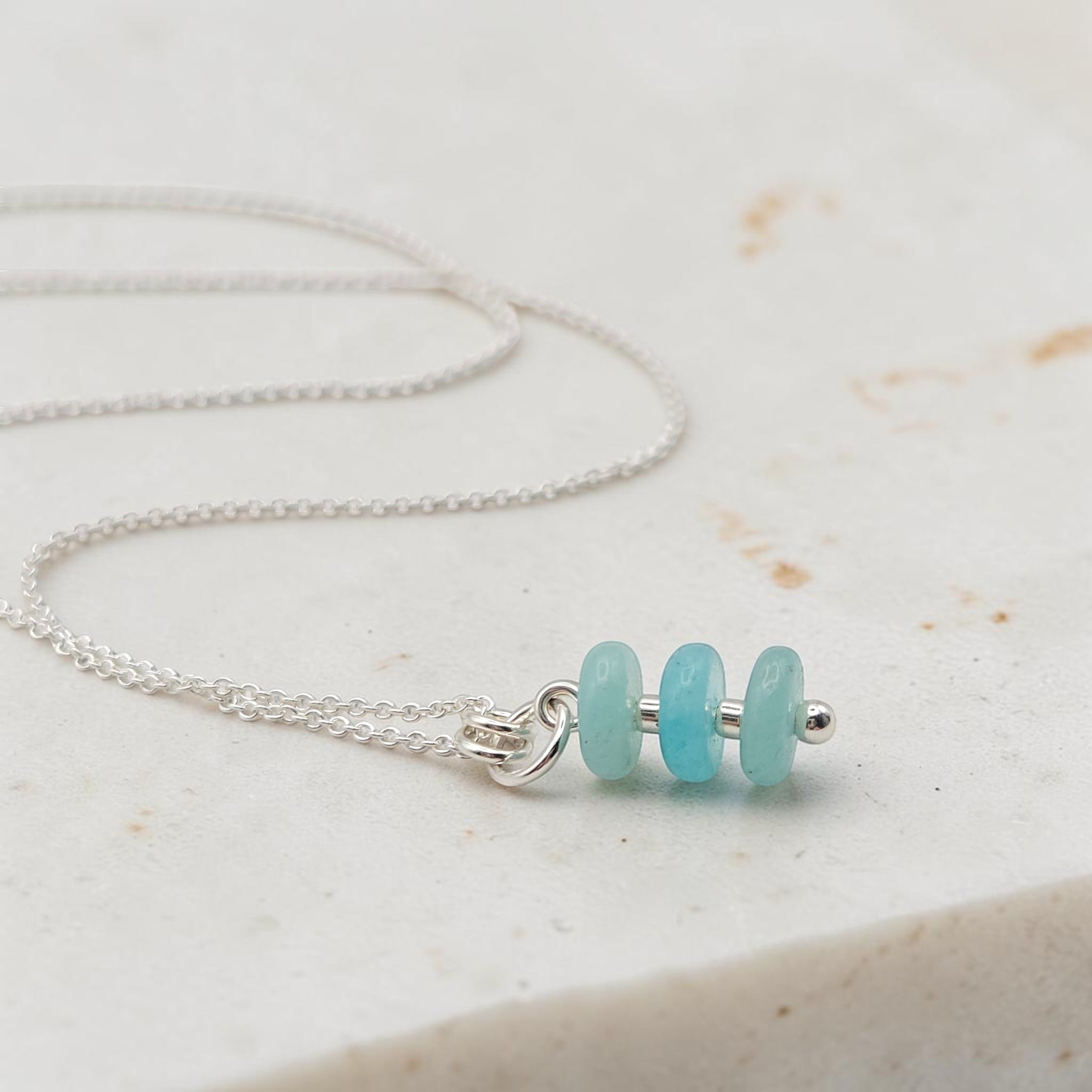 Bijou by SAM Northern Lights necklace featuring three aqua-green amazonite stones on a delicate sterling silver chain.