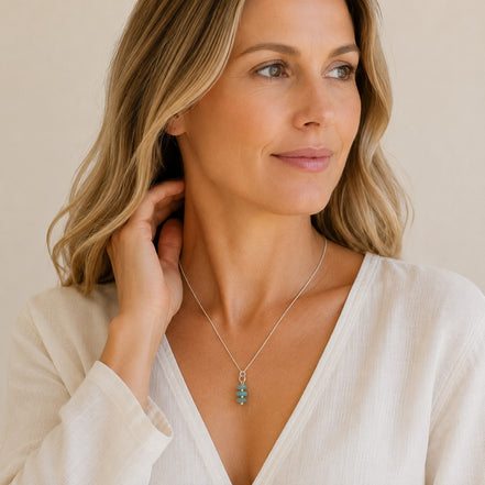 Bijou by SAM Northern Lights necklace featuring three aqua-green amazonite stones on a delicate sterling silver chain.