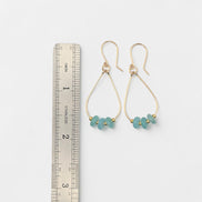 Bijou by SAM Northern Lights teardrop hoop earrings featuring aqua-green amazonite stones on 14k gold fill wire.