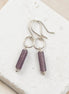 Bijou by SAM Sophia earrings featuring purple amethyst cylinder stones on handcrafted sterling silver hoops