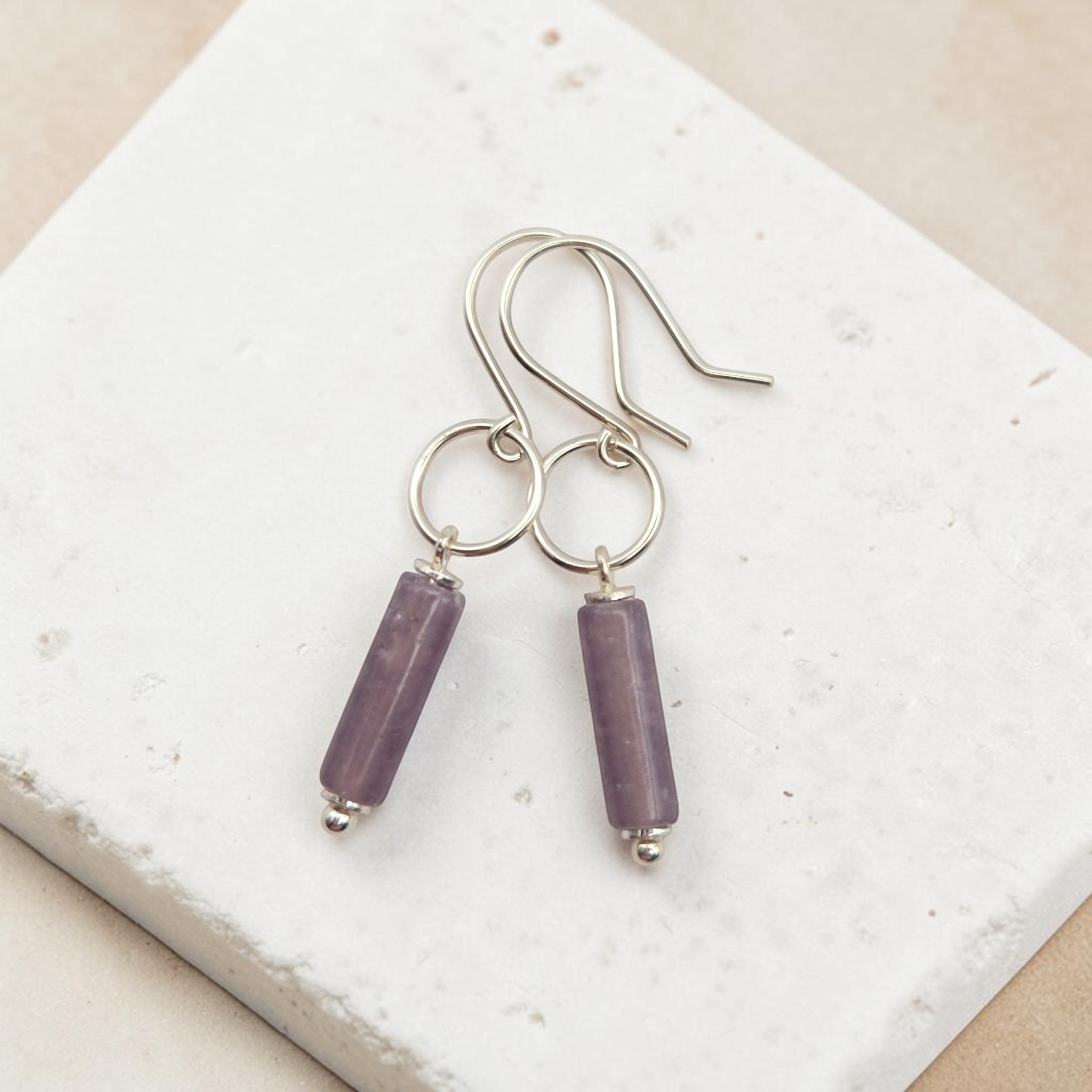 Bijou by SAM Sophia earrings featuring purple amethyst cylinder stones on handcrafted sterling silver hoops