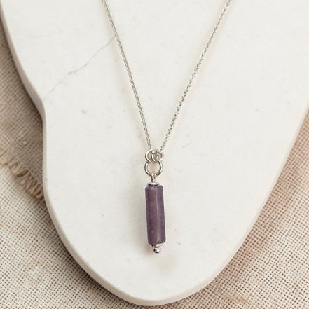 Bijou by SAM Sophia necklace featuring a natural purple amethyst cylinder bead on a delicate sterling silver chain.