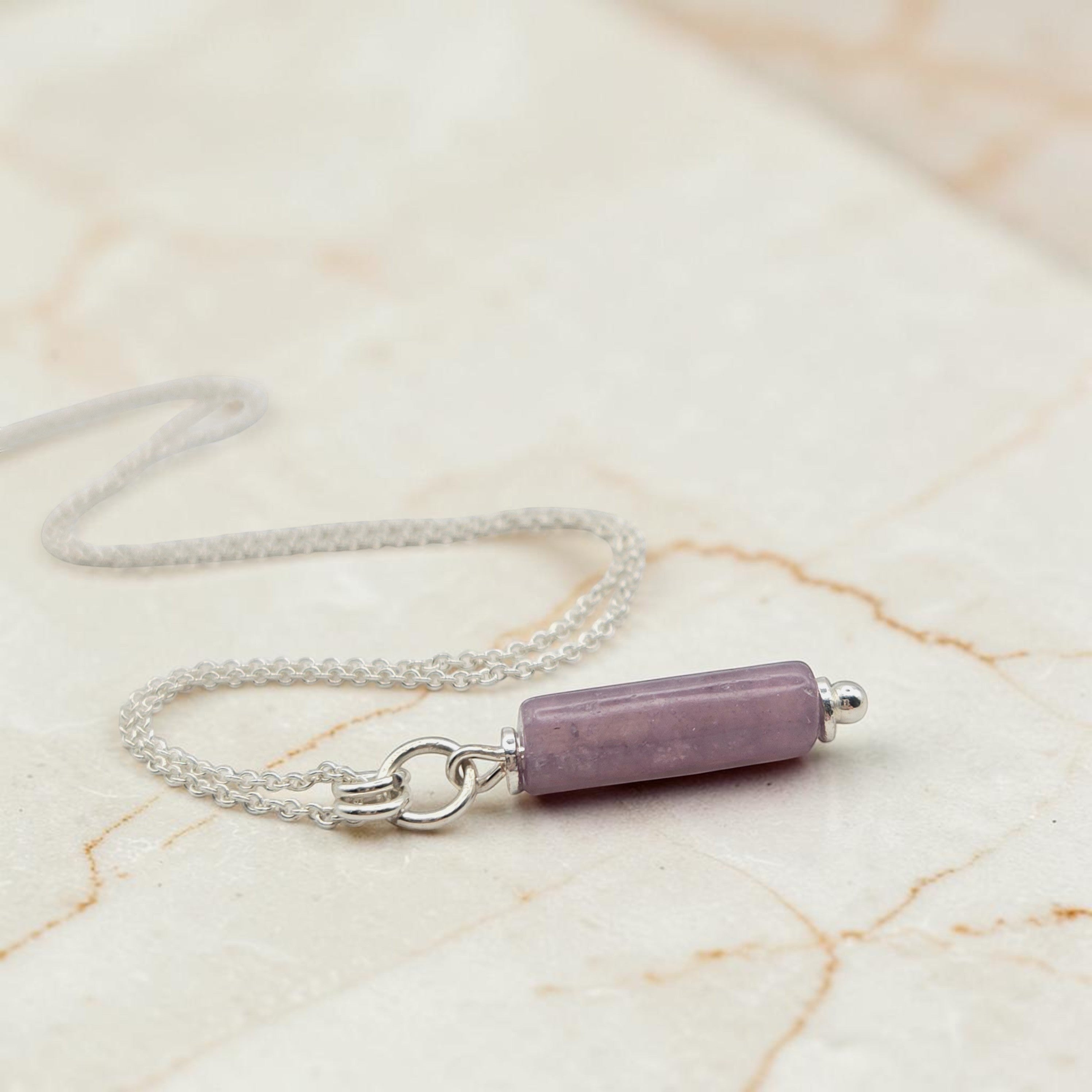 Bijou by SAM Sophia necklace featuring a natural purple amethyst cylinder bead on a delicate sterling silver chain.