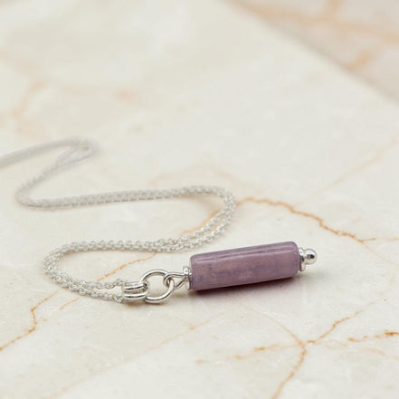 Bijou by SAM Sophia necklace featuring a natural purple amethyst cylinder bead on a delicate sterling silver chain.
