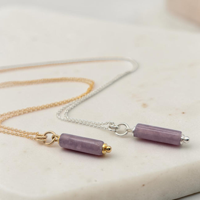 Bijou by SAM Sophia necklace featuring natural purple amethyst cylinder beads on gold fill and sterling silver chains.