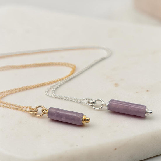 Bijou by SAM Sophia necklace featuring natural purple amethyst cylinder beads on gold fill and sterling silver chains.