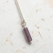 Bijou by SAM Sophia necklace featuring a natural purple amethyst cylinder bead on a delicate sterling silver chain.