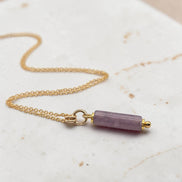 Bijou by SAM Sophia necklace featuring a natural purple amethyst cylinder bead on a delicate 14k gold fill chain.