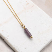 Bijou by SAM Sophia necklace featuring a natural purple amethyst cylinder bead on a delicate 14k gold fill chain.
