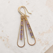 Bijou by SAM Twilight Ridge teardrop earrings featuring purple amethyst tube beads on 14k gold fill hoops.