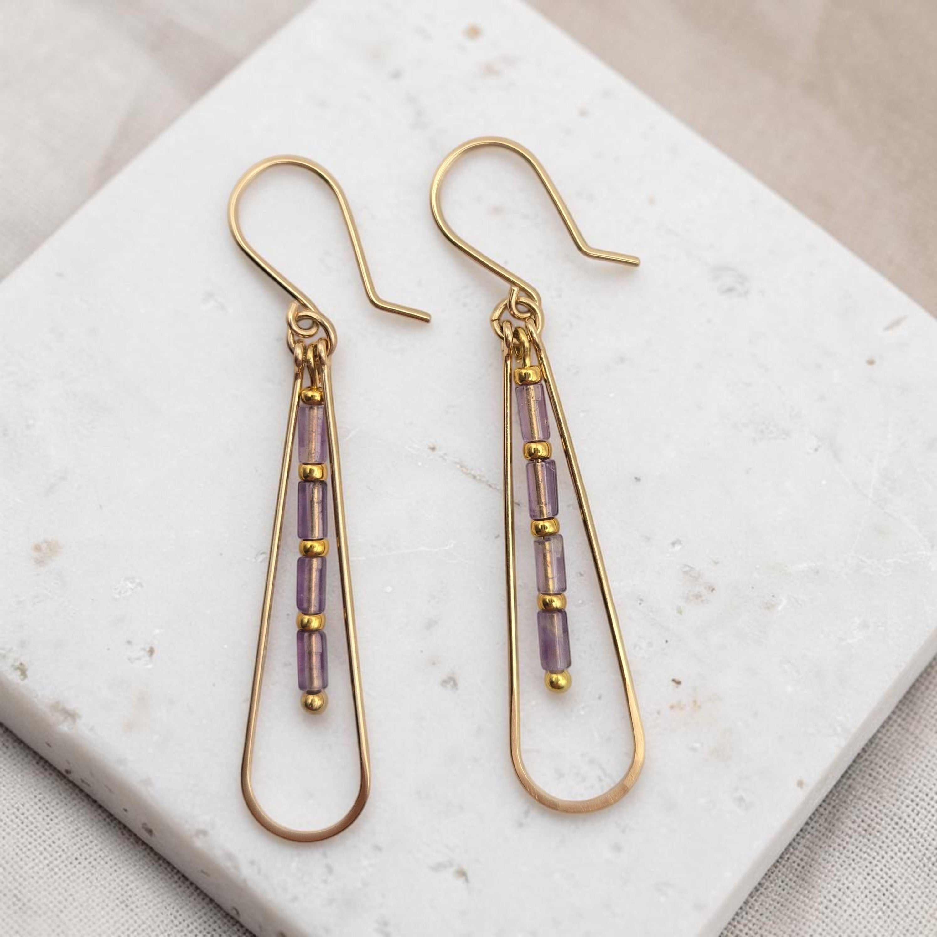 Bijou by SAM Twilight Ridge teardrop earrings featuring purple amethyst tube beads and 14k gold fill hoops.