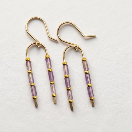 Bijou by SAM handcrafted wishbone earrings featuring purple amethyst tube stones on 14k gold fill wire arcs