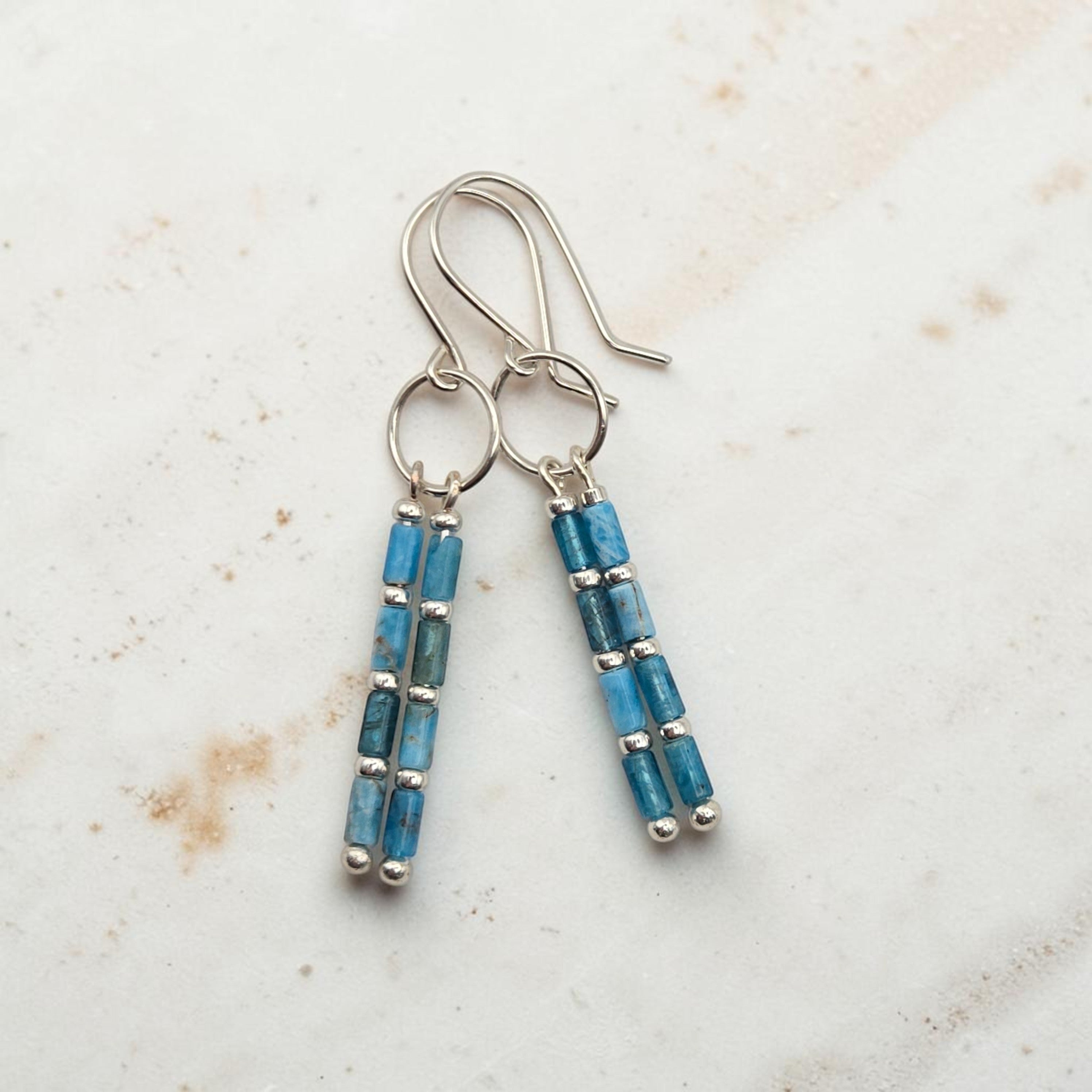 Bijou by SAM Still Water dangle earrings featuring natural blue apatite tube beads on Argentium sterling silver hoops.