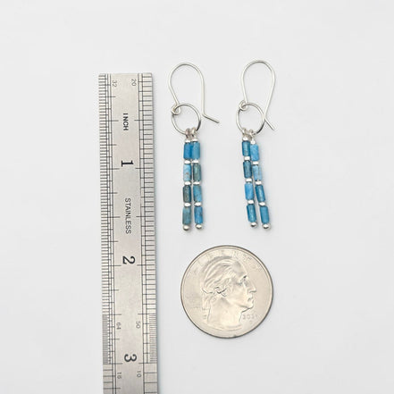 Bijou by SAM Still Water dangle earrings featuring blue apatite tube beads on Argentium sterling silver hoops.