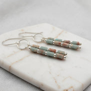 Bijou by SAM Big Sky dangle earrings featuring natural Aqua Terra Jasper tube beads and sterling silver hoops.