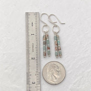 Bijou by SAM Big Sky earrings featuring Aqua Terra Jasper tube beads and sterling silver hoops next to a ruler.