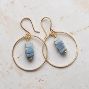 Bijou by SAM handmade gold hoop earrings featuring a delicate stack of square-cut denim blue opal stones.