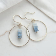 Bijou by SAM handmade hoop earrings featuring a delicate stack of square-cut denim blue opal stones on gold wire.