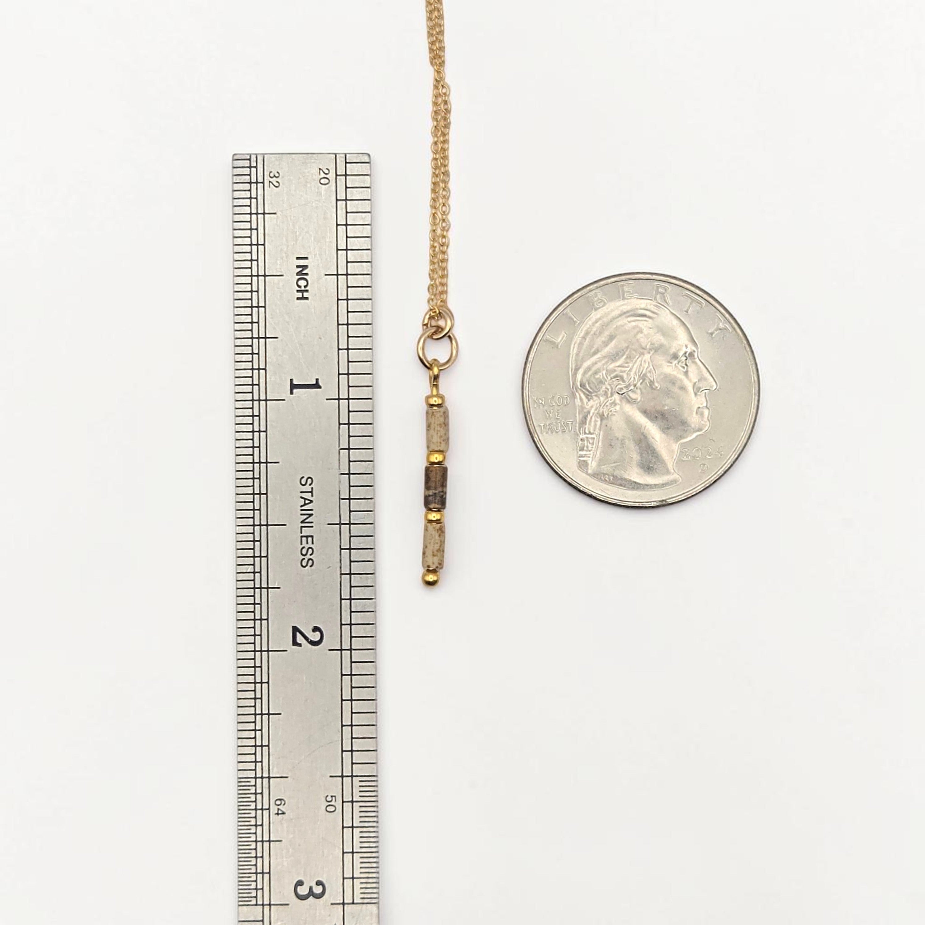 Bijou by SAM Canyon Necklace featuring natural Picture Jasper tube beads on a 14k gold fill chain with scale reference.