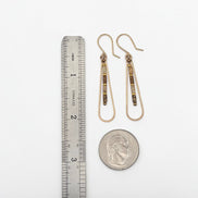 Bijou by SAM Canyon Teardrop Hoops with Picture Jasper beads and 14k gold fill wire, shown with ruler and coin for scale.