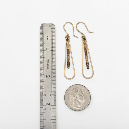 Bijou by SAM Canyon Teardrop Hoops with Picture Jasper beads and 14k gold fill wire, shown with ruler and coin for scale.