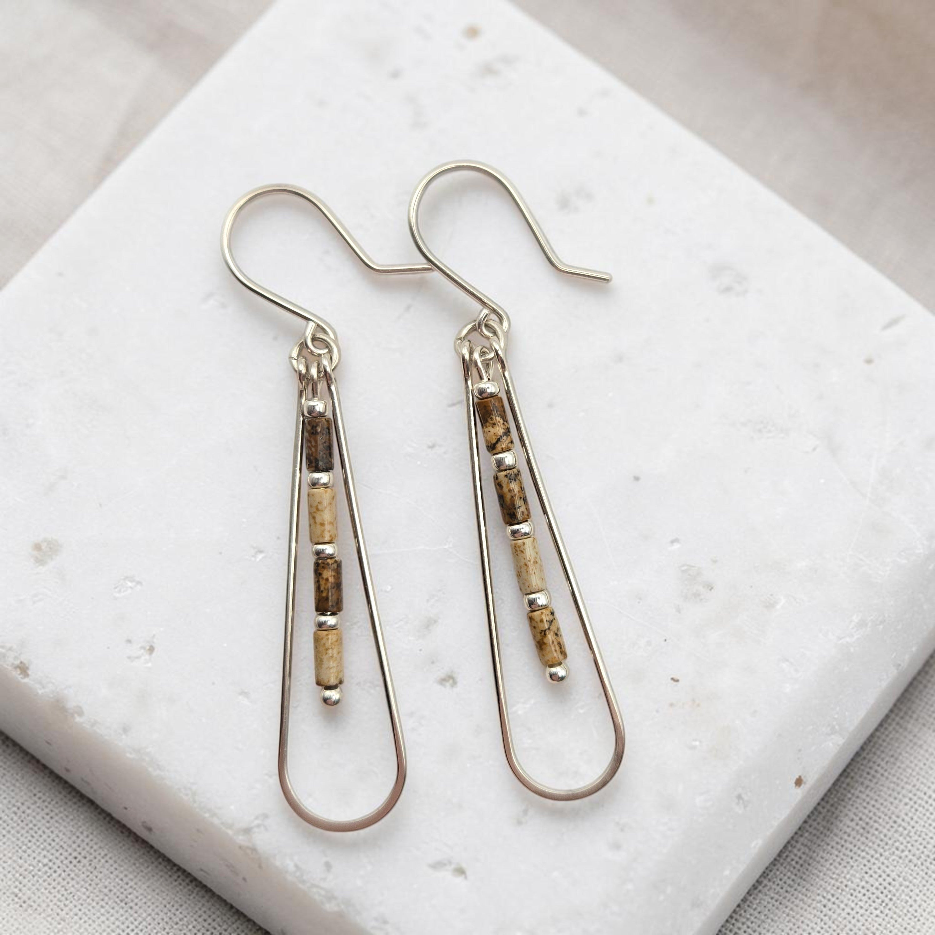 Bijou by SAM Canyon Teardrop Hoops featuring picture jasper tube beads and sterling silver dangles on a stone base.
