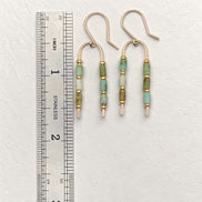 Bijou by SAM handcrafted wishbone earrings featuring green Chrysoprase tube stones on 14k gold fill wire with ruler.