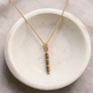 Bijou by SAM Forest Floor necklace featuring a delicate 14k gold fill chain and a natural Unakite gemstone tube pendant.