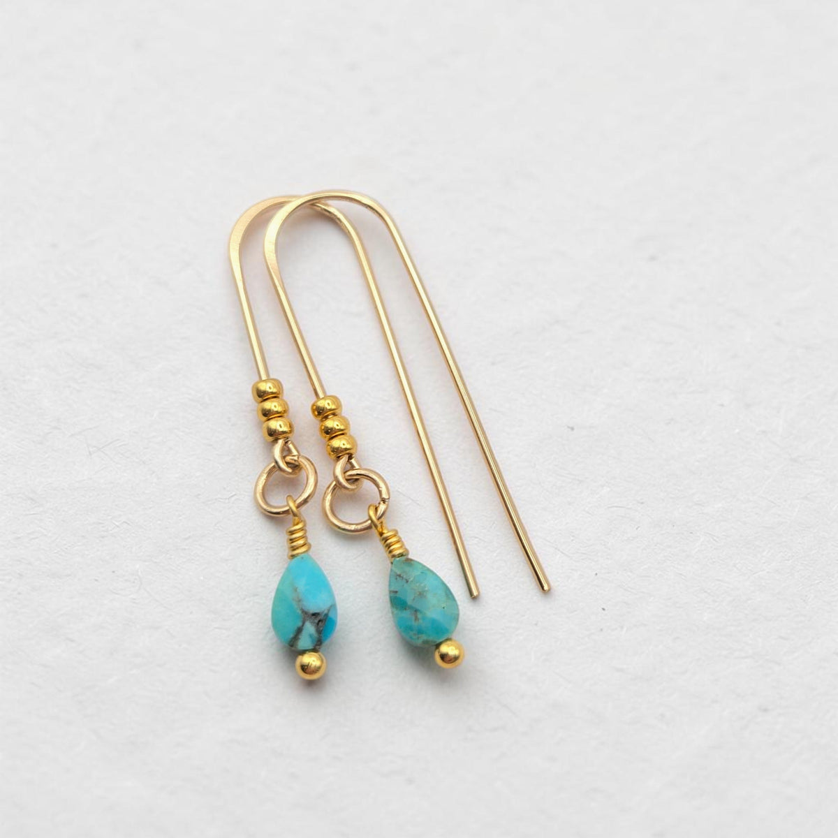 Bijou by SAM handcrafted 14k gold fill threader earrings featuring genuine teardrop turquoise gemstones.