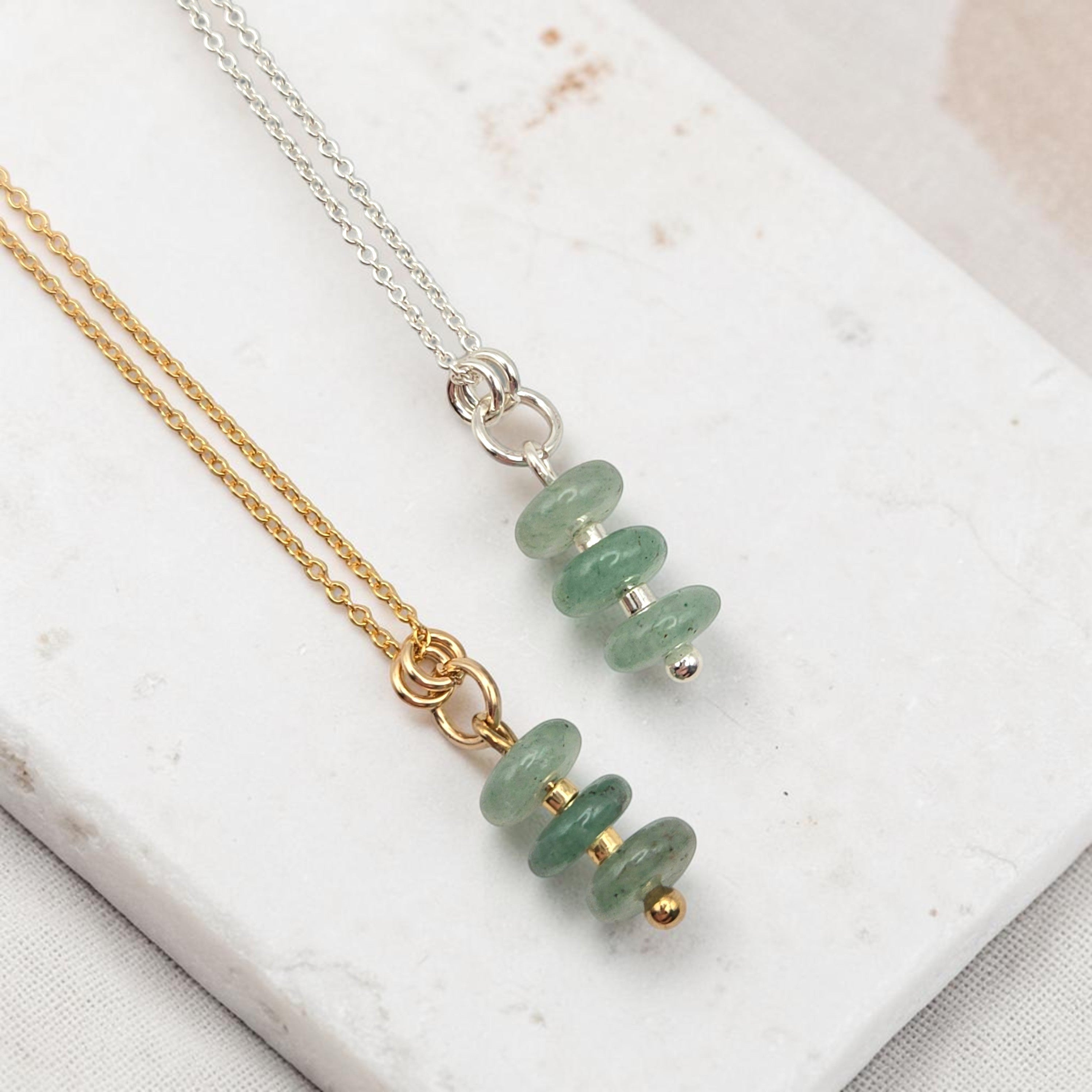 Bijou by SAM Comet necklaces featuring green aventurine stone beads on delicate gold fill and sterling silver chains.