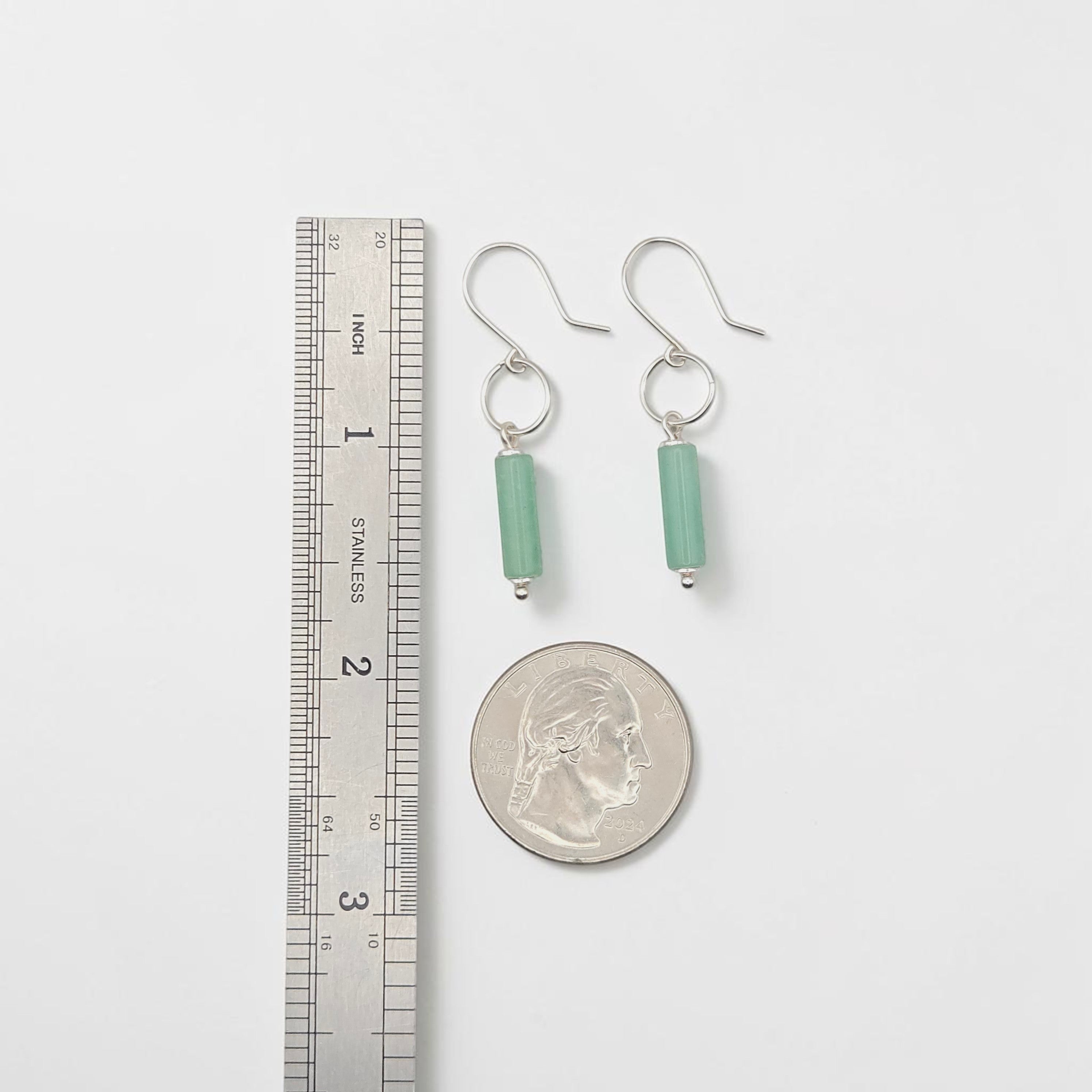 Bijou by SAM Ava earrings featuring cylinder-shaped green aventurine stones on sterling silver hoops for scale.