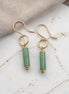 Bijou by SAM Ava earrings featuring cylindrical green aventurine gemstones hanging from 14k gold fill hoops.