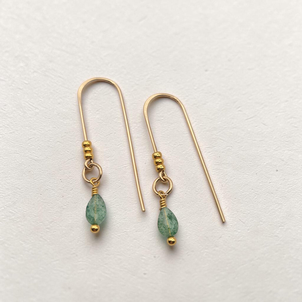 Bijou by SAM teardrop green aventurine threader earrings in 14k gold fill with delicate wire-wrapped gemstone drops.