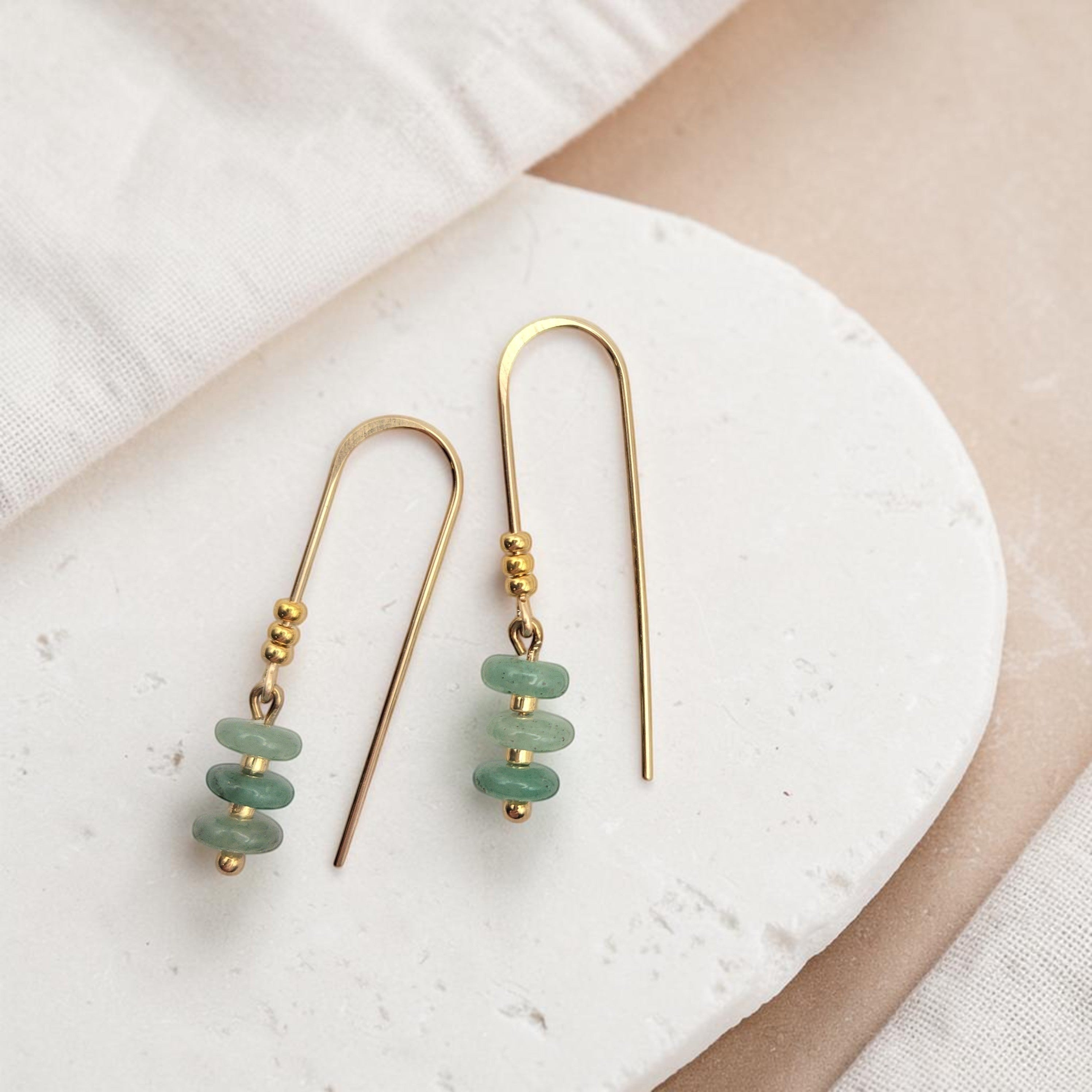 Bijou by SAM Comet Threader earrings featuring soft green aventurine beads on 14k gold fill wire on a stone base.