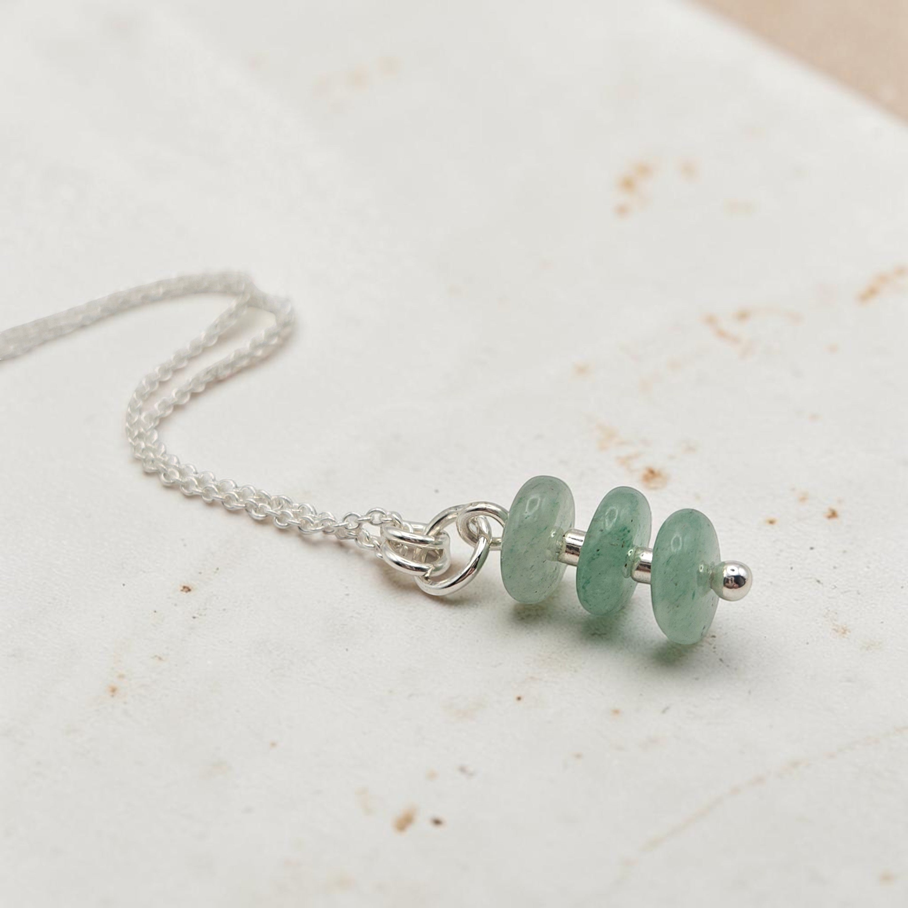 Bijou by SAM Comet necklace featuring three green aventurine stones on a delicate sterling silver chain