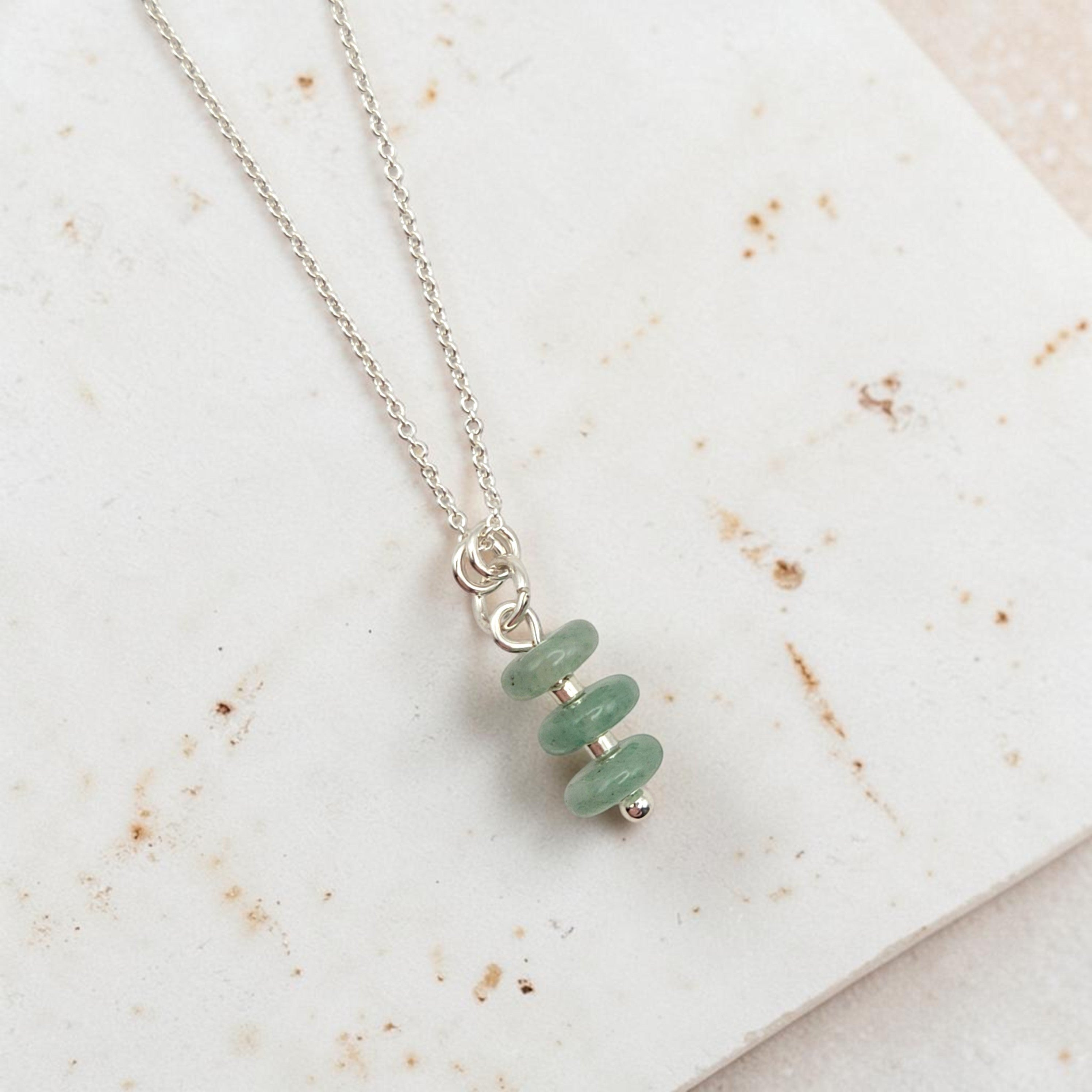 Bijou by SAM Comet necklace featuring three stacked green aventurine stones on a delicate sterling silver chain.