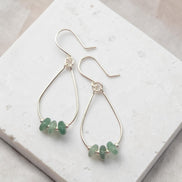 Bijou by SAM handmade sterling silver teardrop hoop earrings featuring small, shimmering green aventurine gemstones.