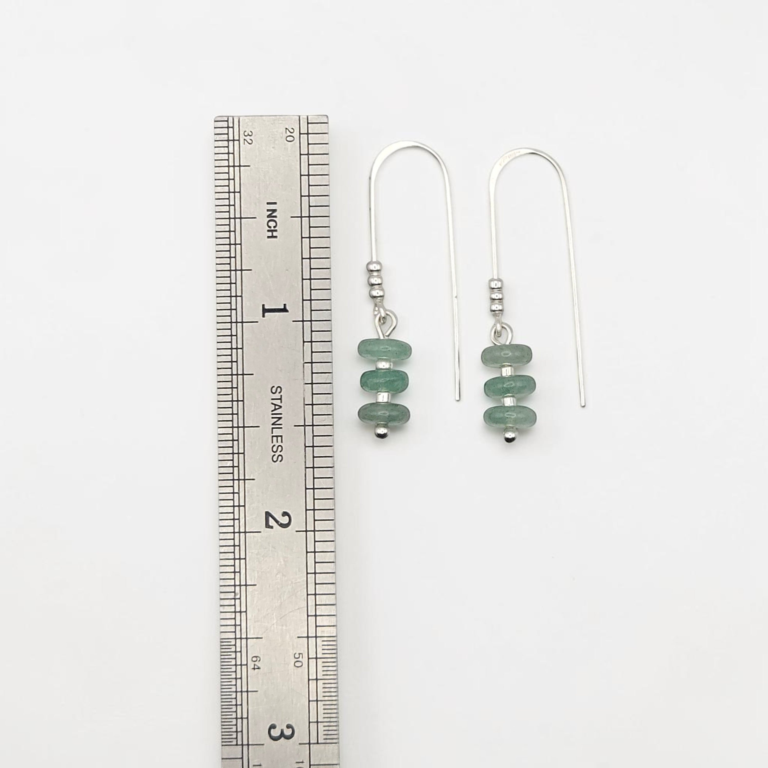 Bijou by SAM Comet Threader earrings featuring green aventurine beads on sterling silver hooks next to a metal ruler.