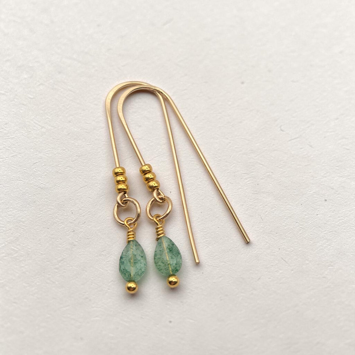 Bijou by SAM handcrafted gold fill threader earrings featuring delicate green aventurine teardrop gemstones.