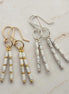 Bijou by SAM First Snow dangle earrings featuring white Howlite tube beads in gold fill and sterling silver options.