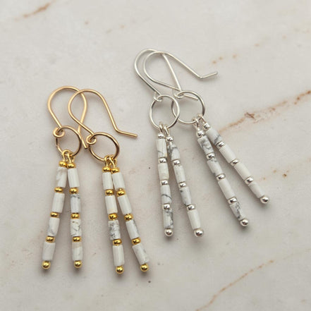 Bijou by SAM First Snow dangle earrings featuring white Howlite tube beads in gold fill and sterling silver options.