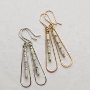 Bijou by SAM First Snow teardrop hoop earrings with white Howlite beads in gold fill and sterling silver.