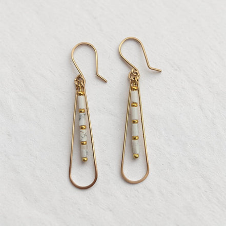 Bijou by SAM First Snow teardrop hoop earrings featuring white Howlite tube beads and 14k gold fill wire.