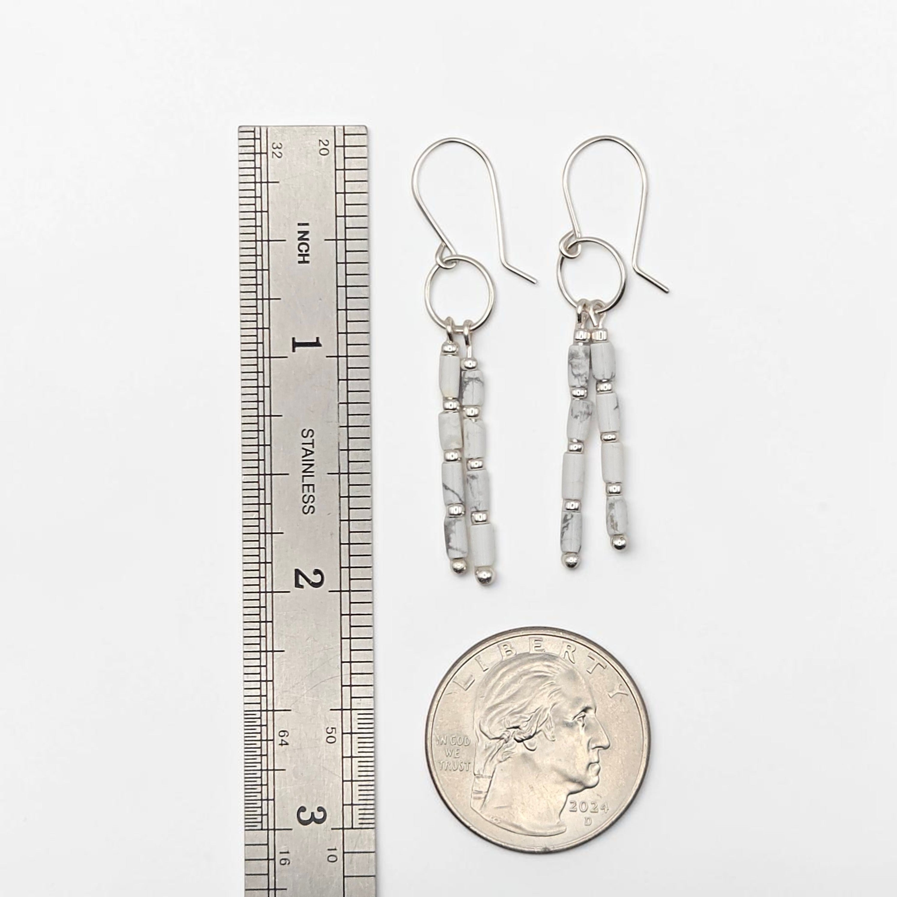 Bijou by SAM First Snow dangle earrings featuring white Howlite tube beads with grey veining on sterling silver hoops.