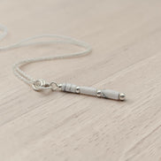 Bijou by SAM First Snow necklace featuring natural white howlite tube beads on a delicate sterling silver chain.