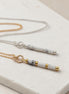 Bijou by SAM First Snow necklaces featuring natural white howlite tube beads on gold fill and sterling silver chains.